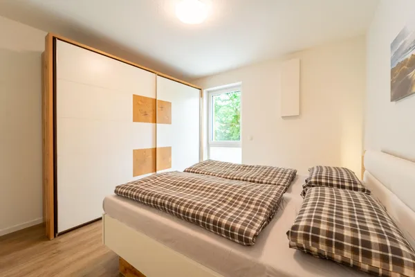 Moderne Ferienwohnung mit SUPs, Balkon und Parkplatz – Schlafzimmer, Ferienwohnung in Bad Zwischenahn
