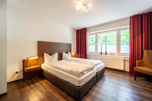 Grand Superior – Schlafzimmer, Ferienwohnung in Bad Zwischenahn