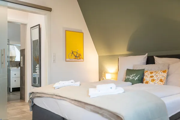 Haus Erde – Schlafzimmer, Ferienwohnung in Bad Zwischenahn
